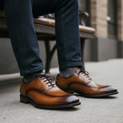 model-sitting-bench - Men's Brown Leather Dress Shoes