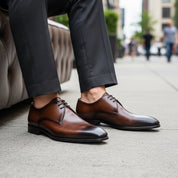 model-sitting-bench - Men's Brown Leather Lace-Up Dress Shoes