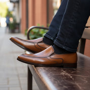 model-sitting-bench - Men's Brown Leather Moccasins