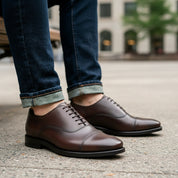 model-sitting-bench - Men's Brown Leather Oxford Dress Shoes