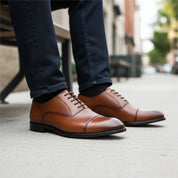 model-sitting-bench - Men's Brown Leather Oxford Dress Shoes