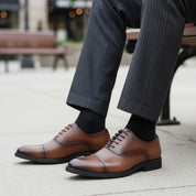 model-sitting-bench - Men's Brown Leather Oxford Dress Shoes