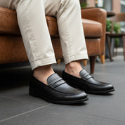 model-sitting-bench - Men's Brown Leather Penny Loafer Shoes