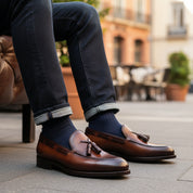 model-sitting-bench - Men's Brown Leather Tassel Loafers