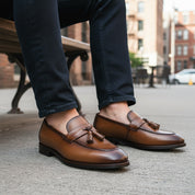 model-sitting-bench - Men's Brown Leather Tassel Loafers