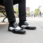 model-sitting-bench - Men's Brown Leather Wingtip Brogues
