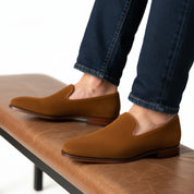model-sitting-bench - Men's Brown Suede Penny Loafer Driving Shoes