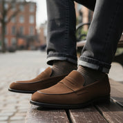 Men's Brown Suede Penny Loafers - model-sitting-bench