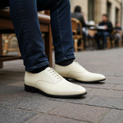 model-sitting-bench - Men's Cream Brogue Dress Shoes in Genuine Calf Leather