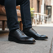 model-sitting-bench - Men's Full Grain Leather Wingtip Formal Shoes