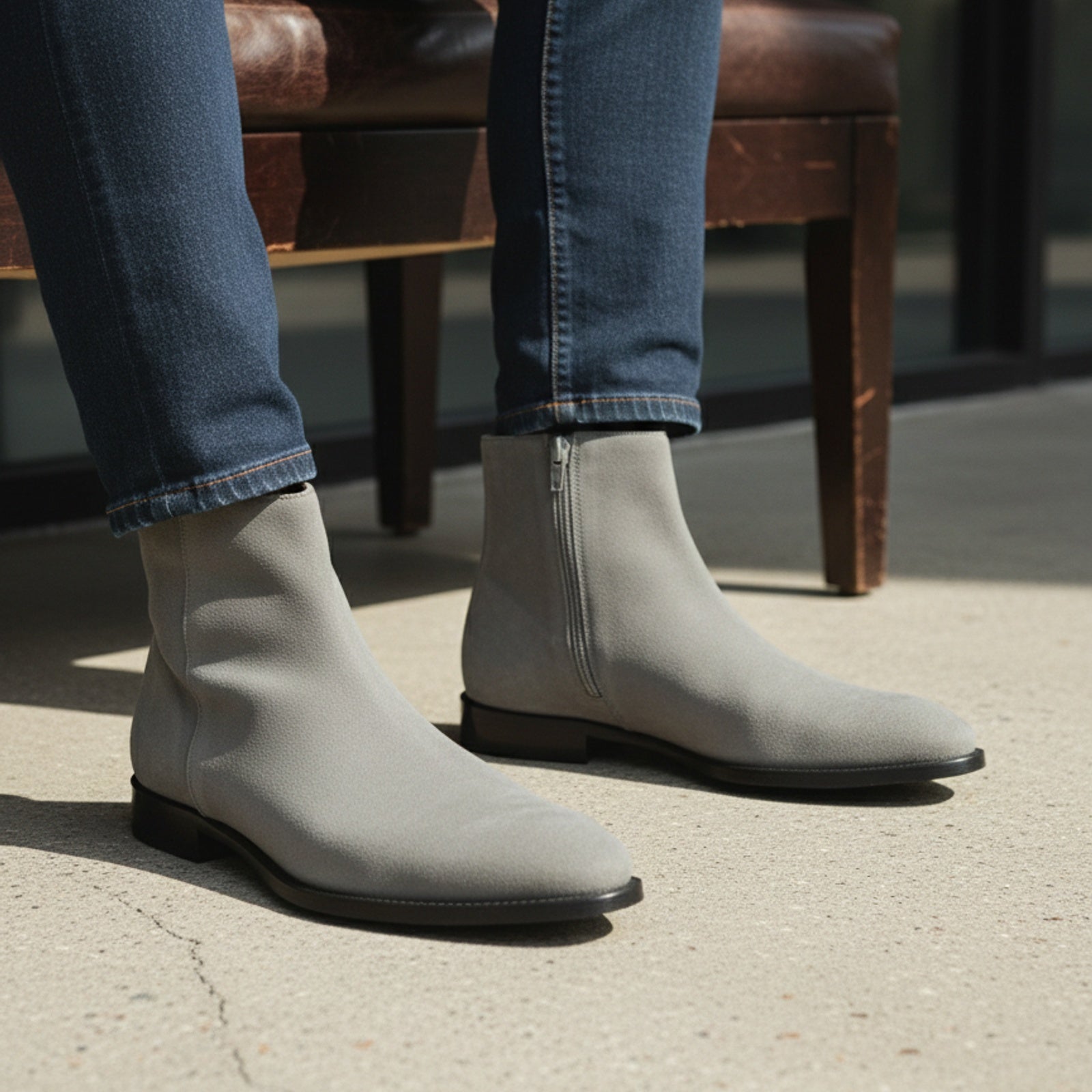 model-sitting-bench - Men's Gray Suede Ankle Boots