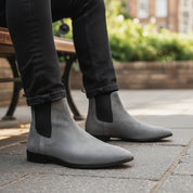 Men's Gray Suede Chelsea Boots - model-sitting-bench