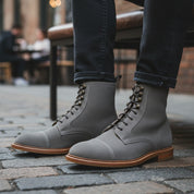 Men's Gray Suede Lace-Up Dress Boots - model-sitting-bench