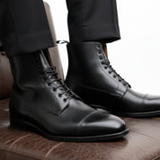 model-sitting-bench - Men's Handmade Black Leather Dress Boots with Custom Features