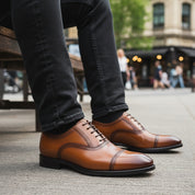 Men's Black Leather Oxford Dress Shoes - model-sitting-bench