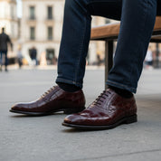 model-sitting-bench - Men's Maroon Leather Dress Shoes