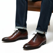 Men's Maroon Leather Oxfords Dress Shoes - model-sitting-bench