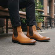 model-sitting-bench - Men's Tan Leather Chelsea Boots