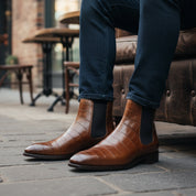 model-sitting-bench - Men's Tan Leather Chelsea Boots