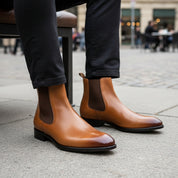 model-sitting-bench - Men's Tan Leather Chelsea Boots