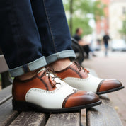 model-sitting-bench - Men's Two-tone Calf Leather Oxford Dress Shoes