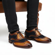 Men's Two-tone Wingtip Brogue Leather Dress Shoes - model-sitting-bench