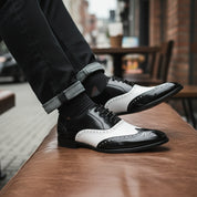 Men's Two-Tone Wingtip Leather Dress Shoes - model-sitting-bench