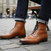 Men's Wingtip Lace-Up Leather Ankle Boots - model-sitting-bench