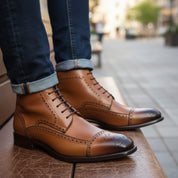 Tan Brown Wing Tip Brogue Ankle Boots - model-sitting-bench
