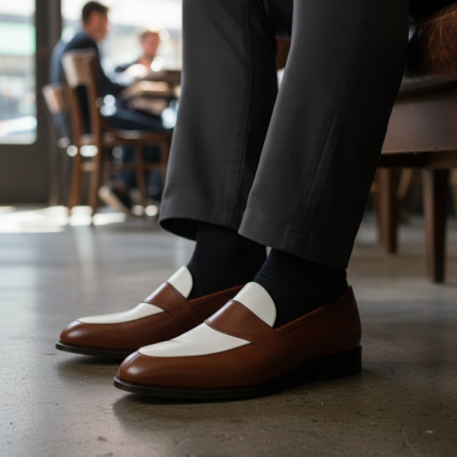 Two-Tone Leather Loafer Moccasins in Brown and White - model-sitting-bench
