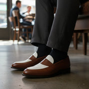 Two-Tone Leather Loafer Moccasins in Brown and White - model-sitting-bench