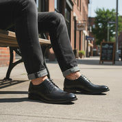 model-sitting - Men's Black & Brown Leather Wingtip Dress Shoes