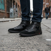 model-standing - Men's Black Leather High-Top Motorcycle Sneakers