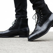 Men's Black Leather Ankle Boots with Cap Toe - model-walking-street