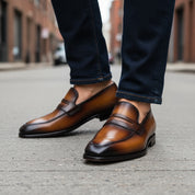 Men's Almond Toe Moccasin Dress Shoes in Tan and Black Leather - model-walking-street