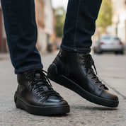 model-walking-street - Men's Black Leather Biker Sneakers