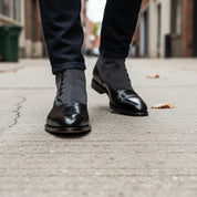 model-walking-street - Men's Black Leather Button Boots with Two-Toned Design