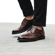 model-walking-street - Men's Brown Leather Wingtip Oxfords