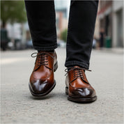 model-walking-street - Men's Tan Leather Wingtip Dress Shoes