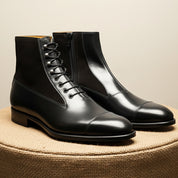 Men's Black Leather Ankle Boots with Cap Toe - pedestal-view