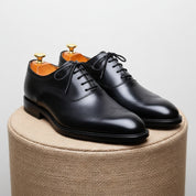 Men's Black Leather Wingtip Oxford Dress Shoes - pedestal-view