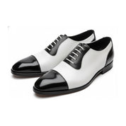 Men's Black and White Spectator Dress Shoes - three-quarter-view
