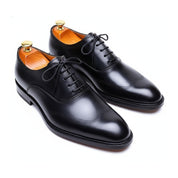 Men's Black Leather Wingtip Oxford Dress Shoes - three-quarter-view