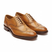 Men's Wingtip Brogue Leather Dress Shoes in Tan - three-quarter-view
